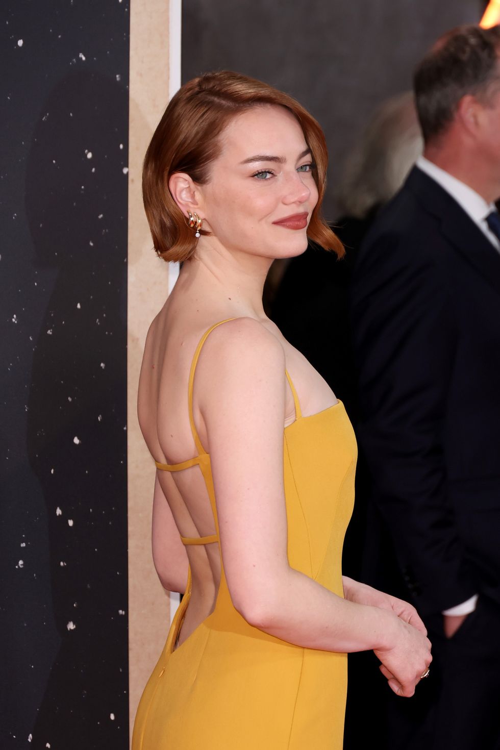 https://hips.hearstapps.com/hmg-prod/images/emma-stone-attends-the-bugonia-headline-gala-at-the-69th-news-photo-1760203733.pjpeg?crop=0.96507xw%3A1xh%3Bcenter%2Ctop&resize=980%3A%2A