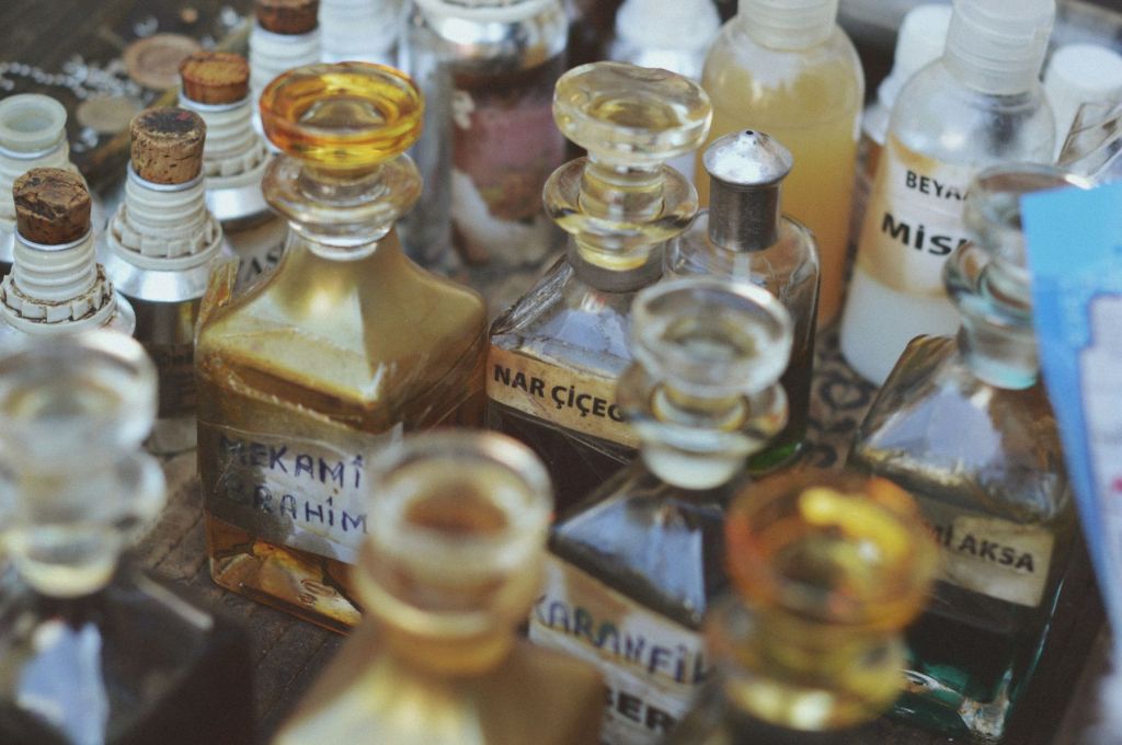 Close view of labelled glass fragrance bottles